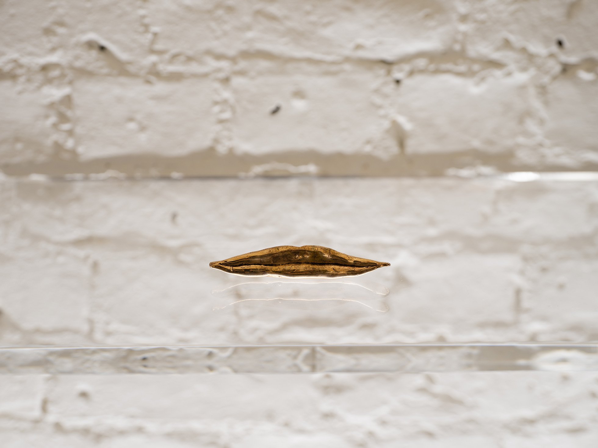 Sidsel Meineche Hansen, Mellow smile, wax cast in bronze, 10 x 2 x 2 cm (4 x 3/4 x 3/4 in), 2021