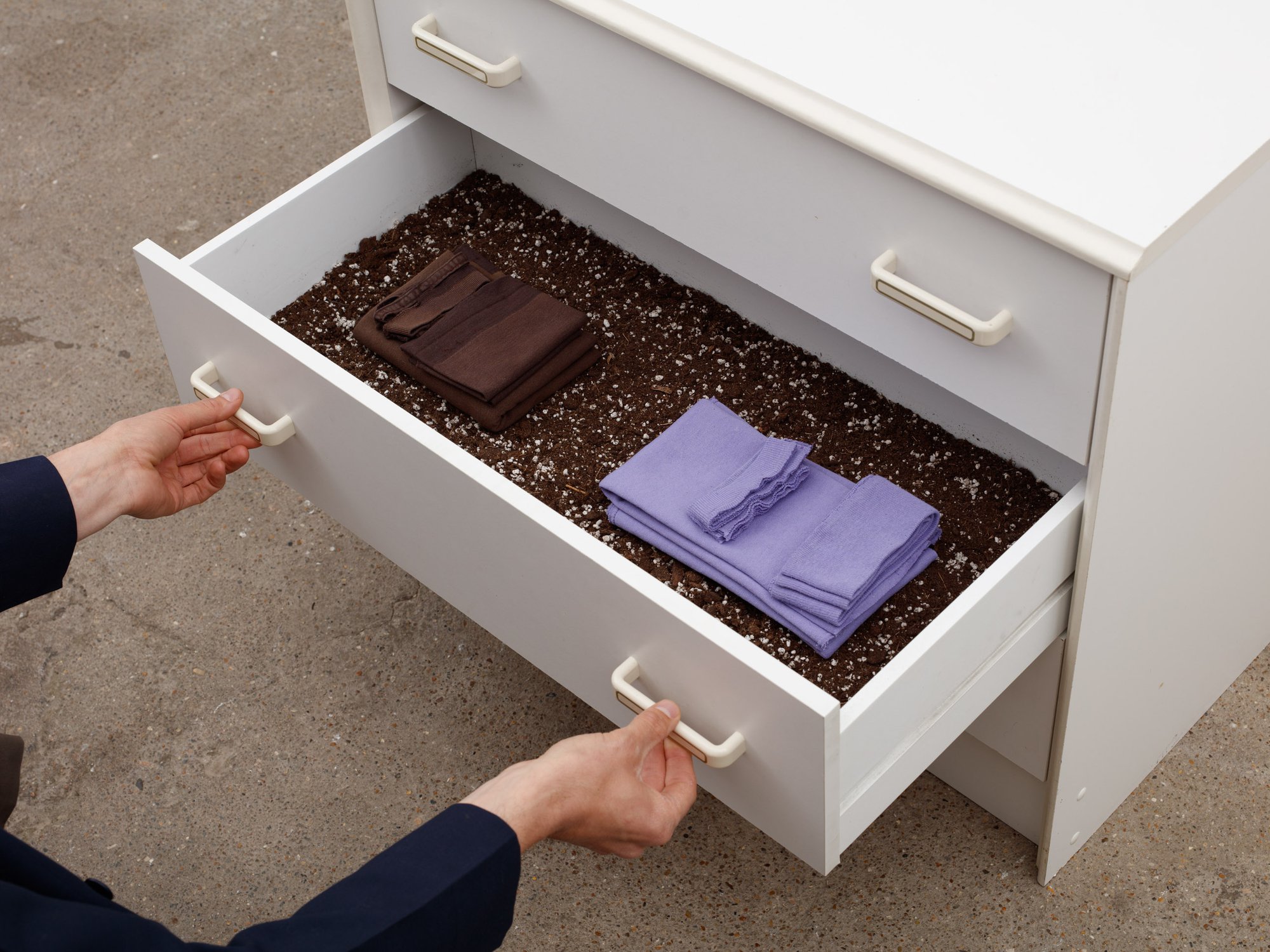 Ian Law, untitled, chest of drawers, ceramic by Marianne Measures (1970-2010), potting soil, unpicked t-shirts, 69 x 76.5 x 40 cm (27 1/8 x 30 1/8 x 15 3/4 in), 2020