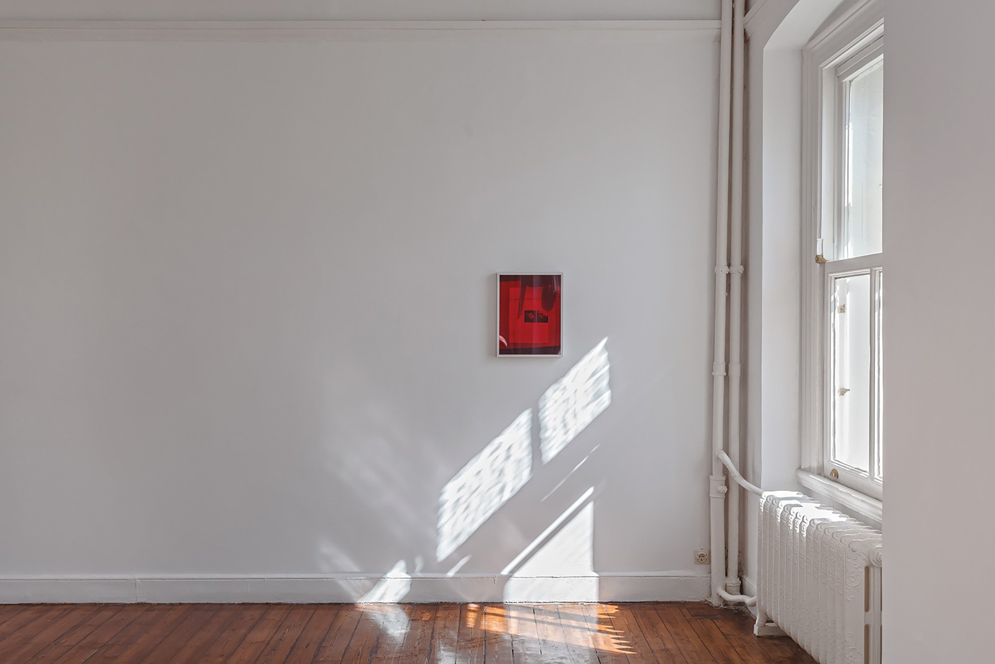 James Richards, Untitled (dark), analog colour photograph, red perspex, frame, 2013. Installation view, The Screens, Rodeo, Istanbul, 2013