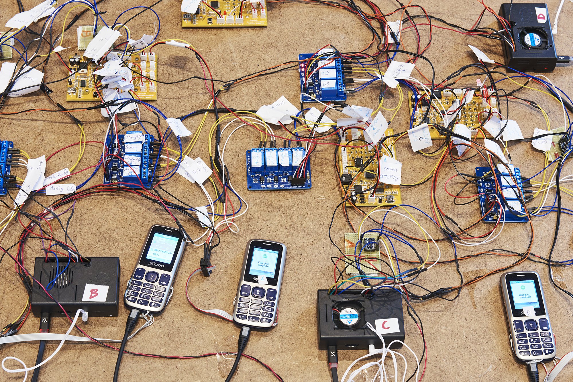 Shadi Habib Allah, Did you see me this time, with your own eyes?, detail, Raspberry Pi computers, Z-Line phones and chargers, microcontrollers, video with sound, dimensions variable, 2018
