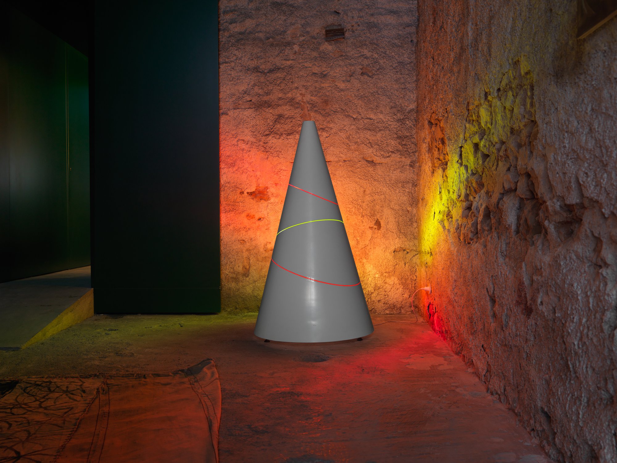 Liliane Lijn, Three Line Koan, glass fibre, Polyester resin, fluorescent red, orange and green Perspex, motorised turntable, fluorescent light, 142 x 79.5 cm base diameter (55 7/8 x 31 1/4 in base diameter), 2008