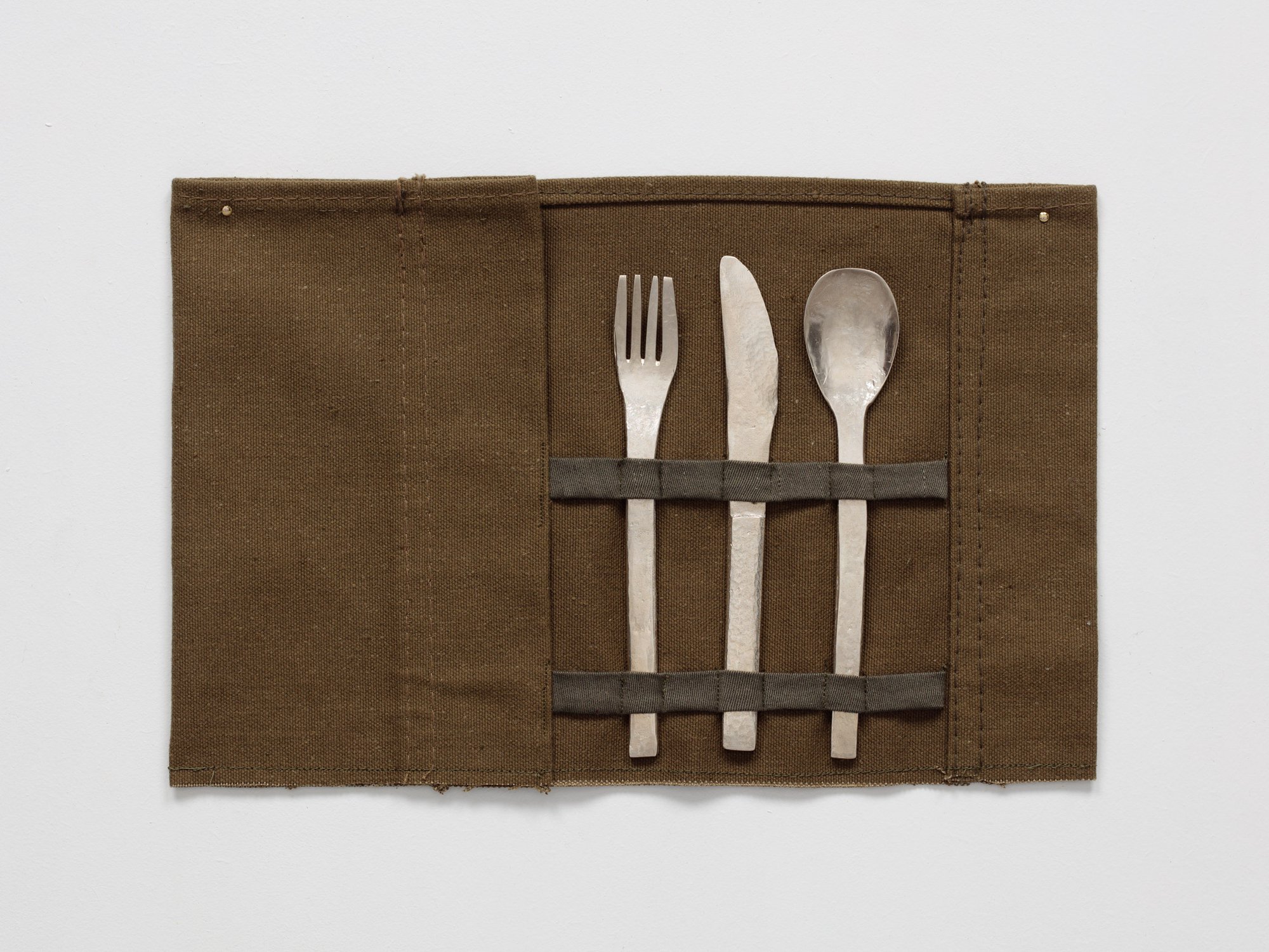 Sidsel Meineche Hansen, home vs owner, cutlery cast in silver, fabric support made by Louis Backhouse, 25 x 43 cm (9 7/8 x 16 7/8 in), 2020